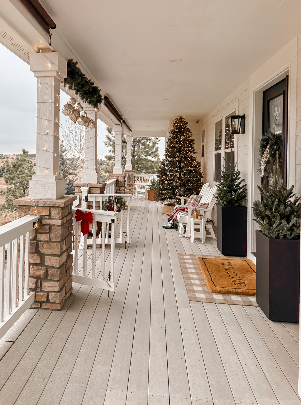 Cozy Farmhouse Christmas Porch. Modern farmhouse porch decorated for Christmas. 