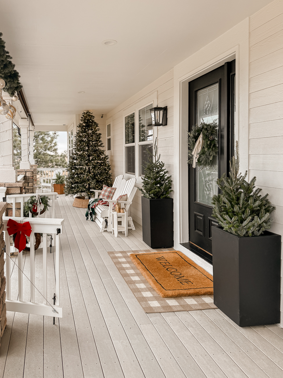 Cozy Farmhouse Christmas Porch. Modern farmhouse porch decorated for Christmas. 
