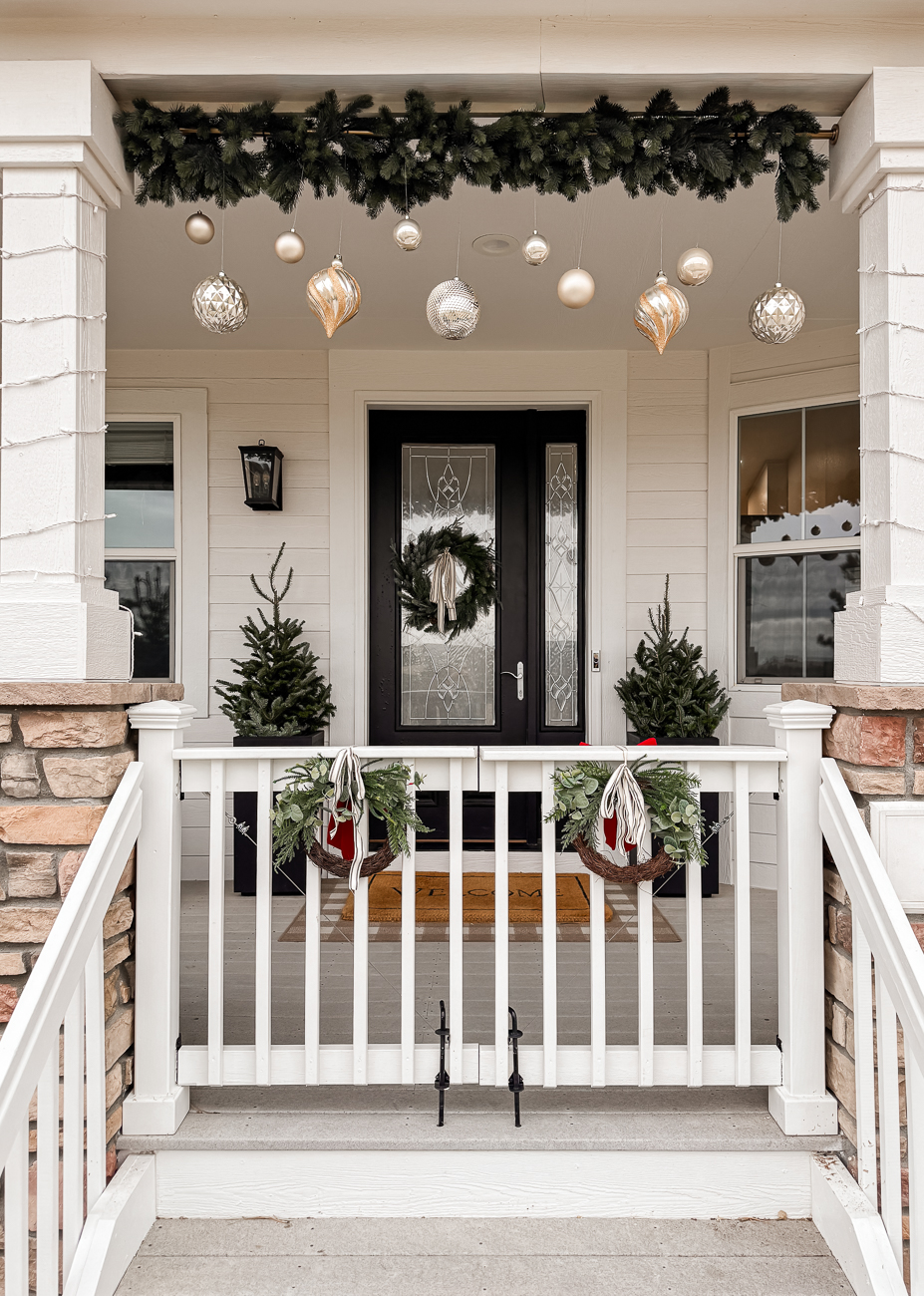 Cozy Farmhouse Christmas Porch. Modern farmhouse porch decorated for Christmas. 