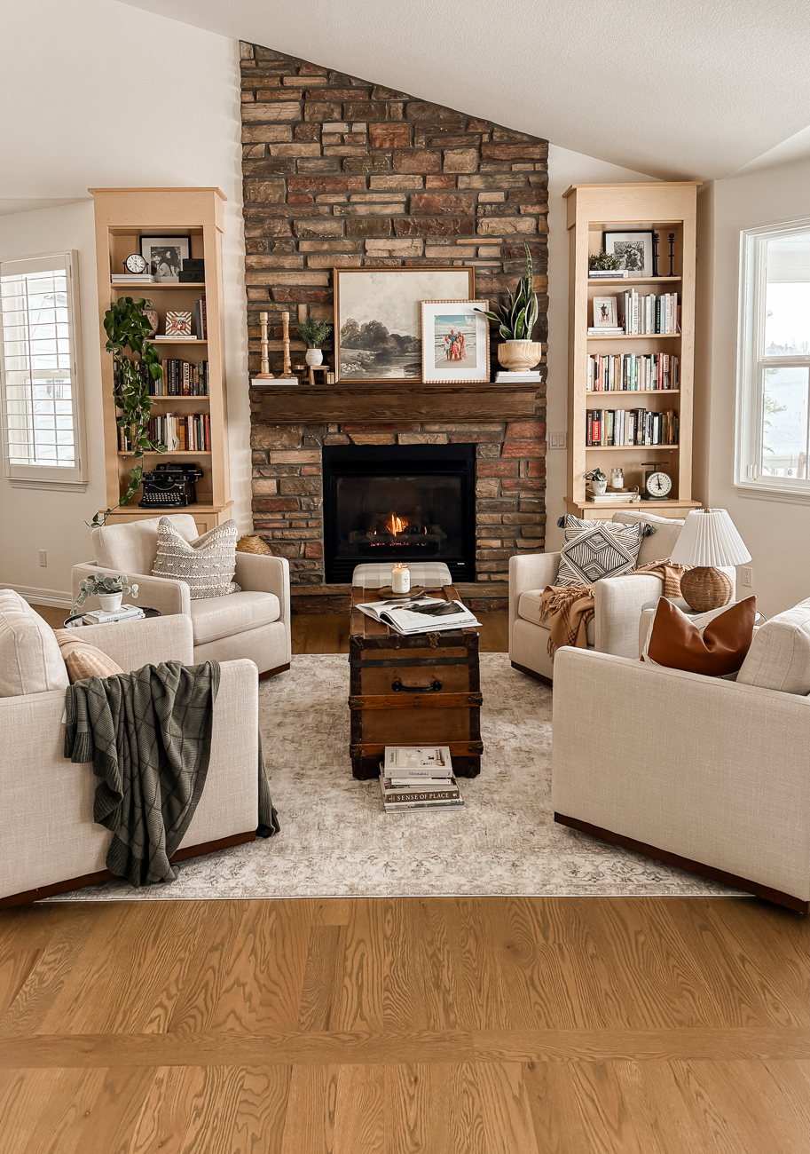 Bookshelves in the Front Room! Cozy sitting room with bookshelves on either side of fireplace.