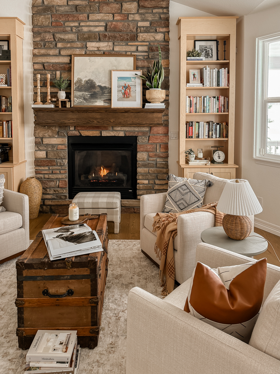 Bookshelves in the Front Room! Cozy sitting room with bookshelves on either side of fireplace.