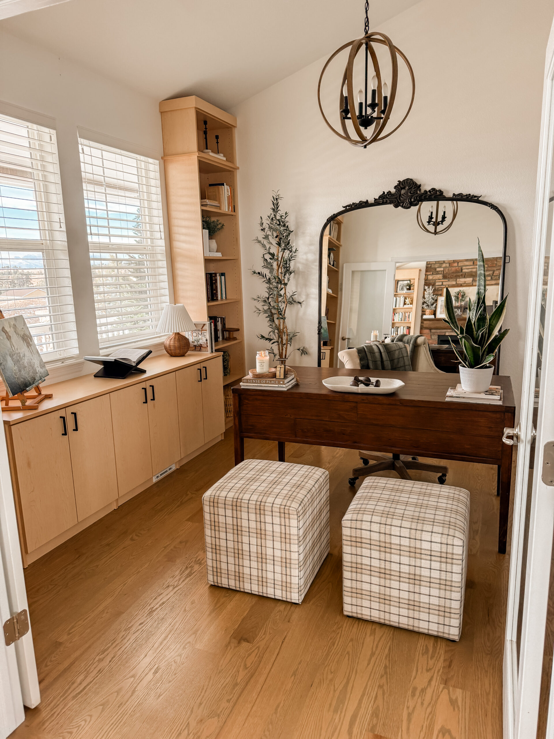 Home Office Transformation. Office makeover with bookshelves and cozy desk area.