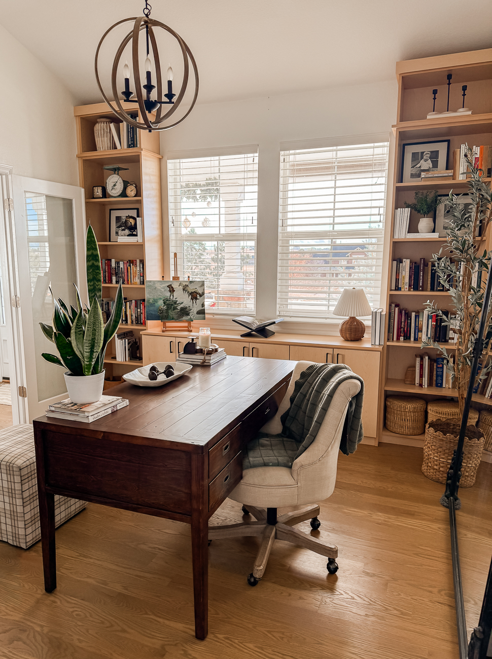 Home Office Transformation. Office makeover with bookshelves and cozy desk area.